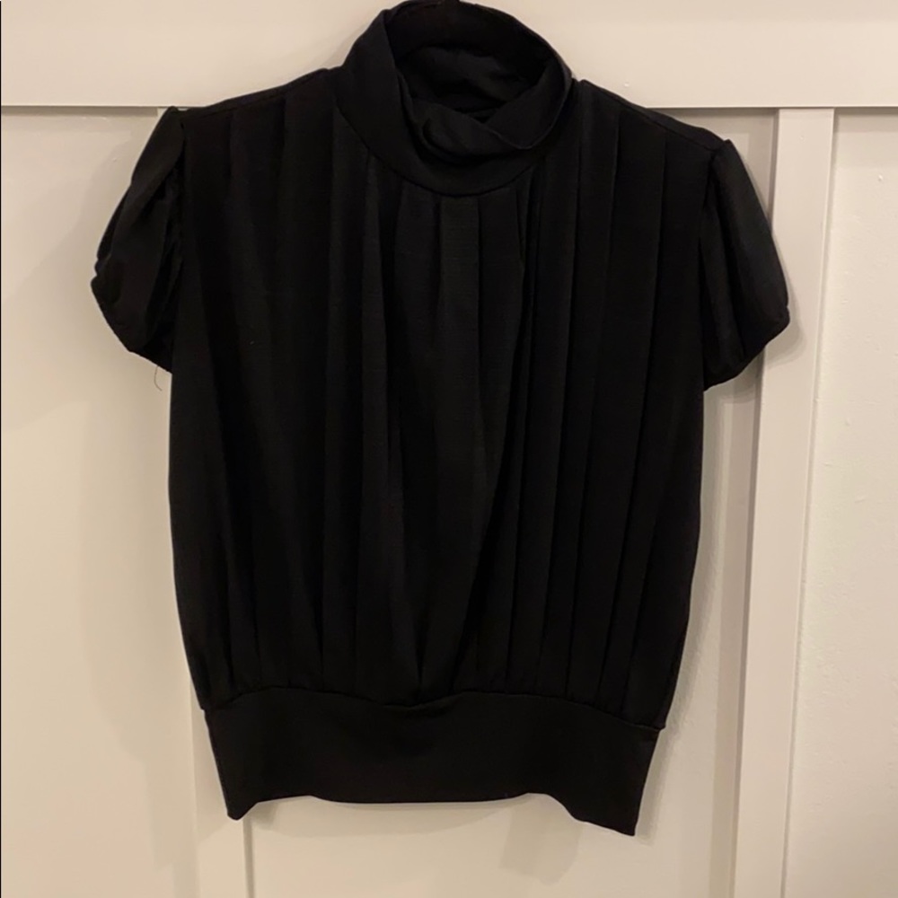 High neck, snatched waist, puff sleeve, keyhole